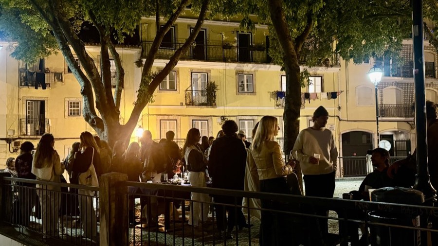the FRONT bar private terrace — Praça das Flores at night